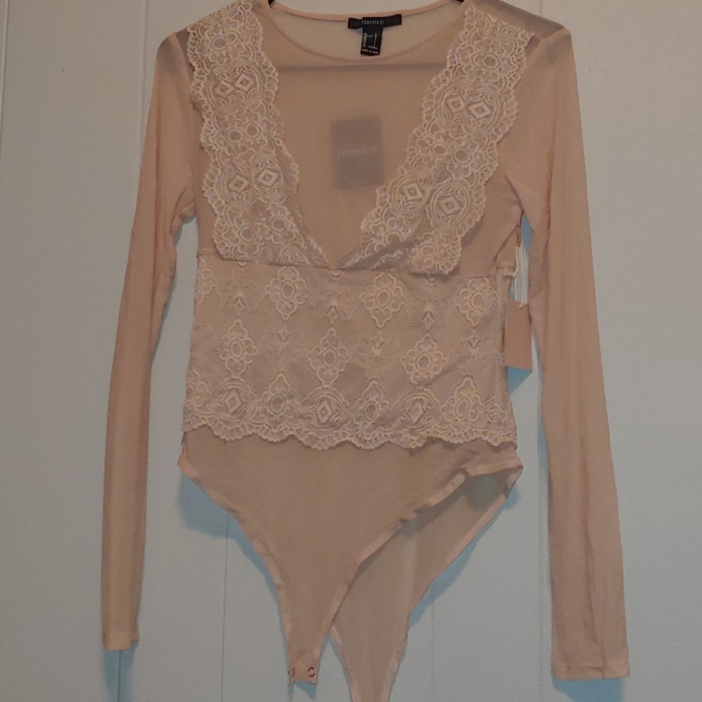 Long sleeved laced body suit